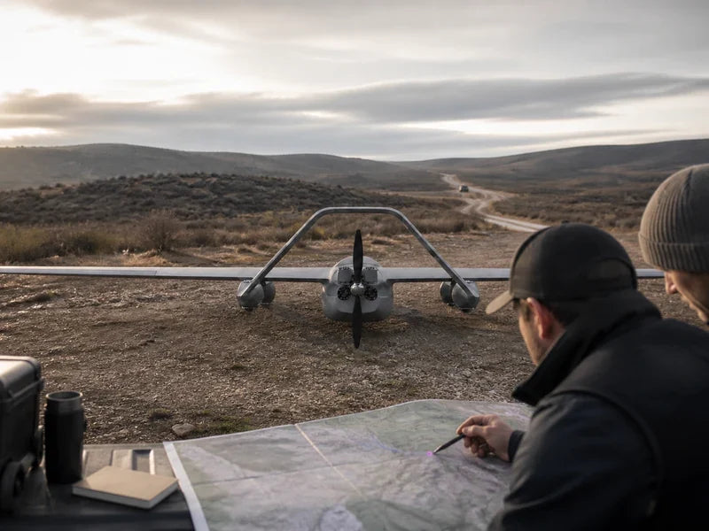 UG73 route-inspection VTOL near a remote corridor while planners review recovery and coverage assumptions