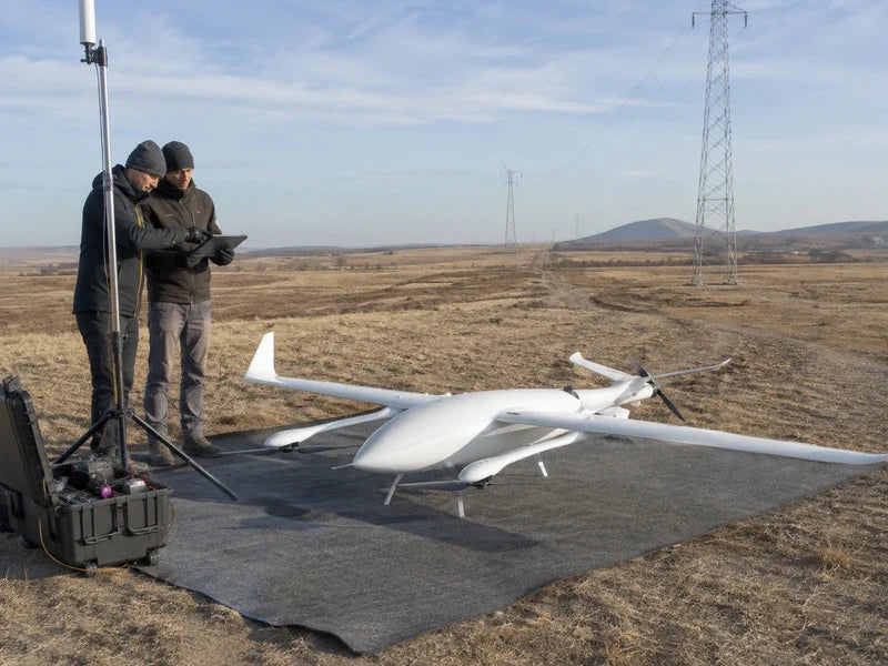 Complete UG39 fixed-wing VTOL at a remote corridor communications survey site