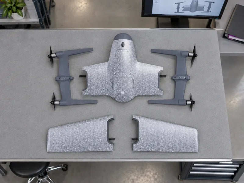 UVH-PNP reference components laid out unassembled on a padded workshop bench.