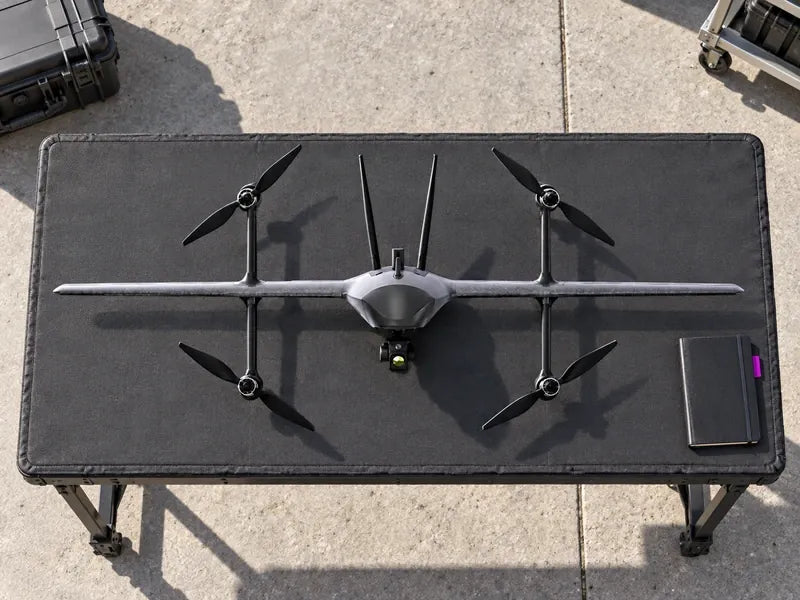 UVH2 seen from the approved overhead angle on a padded field bench in a clean inspection staging area