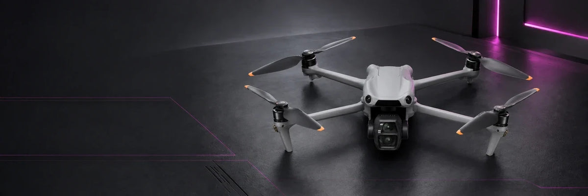 DJI Air 3S with its dual-camera gimbal on a dark graphite background with magenta accents, representing the DJI Air Series.