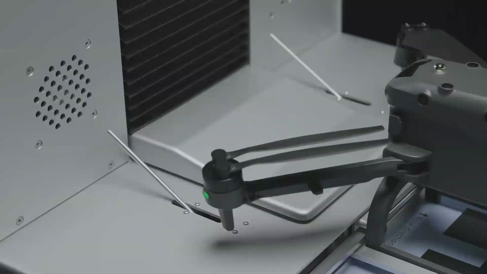 Quick battery replacement system of Drone Docking Station UK02, capable of changing up to 4 batteries in less than 2 minutes for continuous operation.